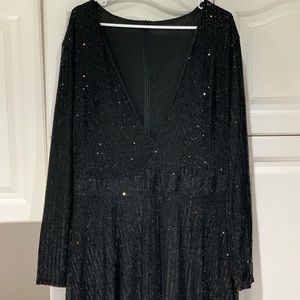 Long black sequin dress , Looks big in picture but is fitting to your body .